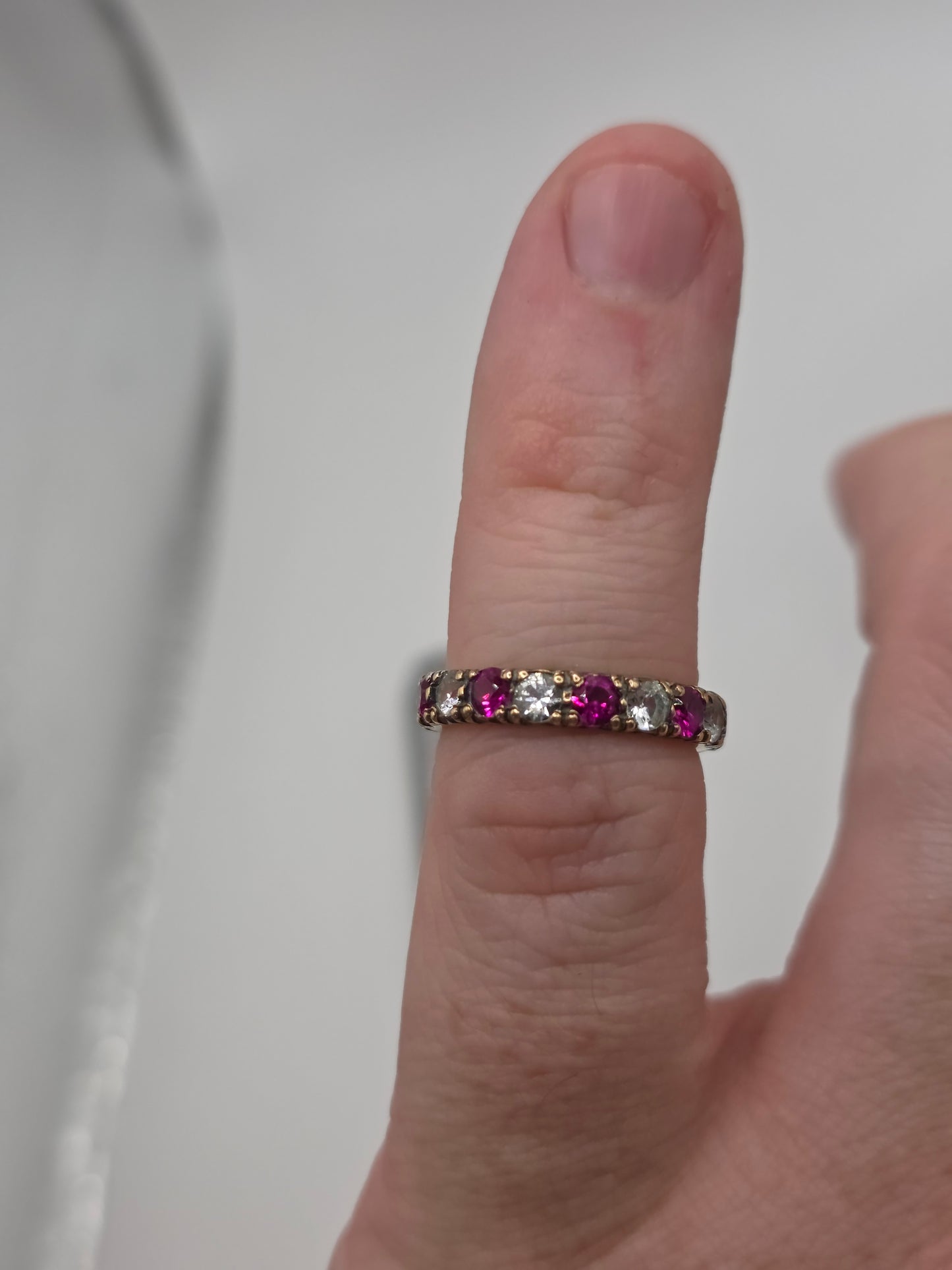 Eternity 9ct gold synthetic ruby and cz ring