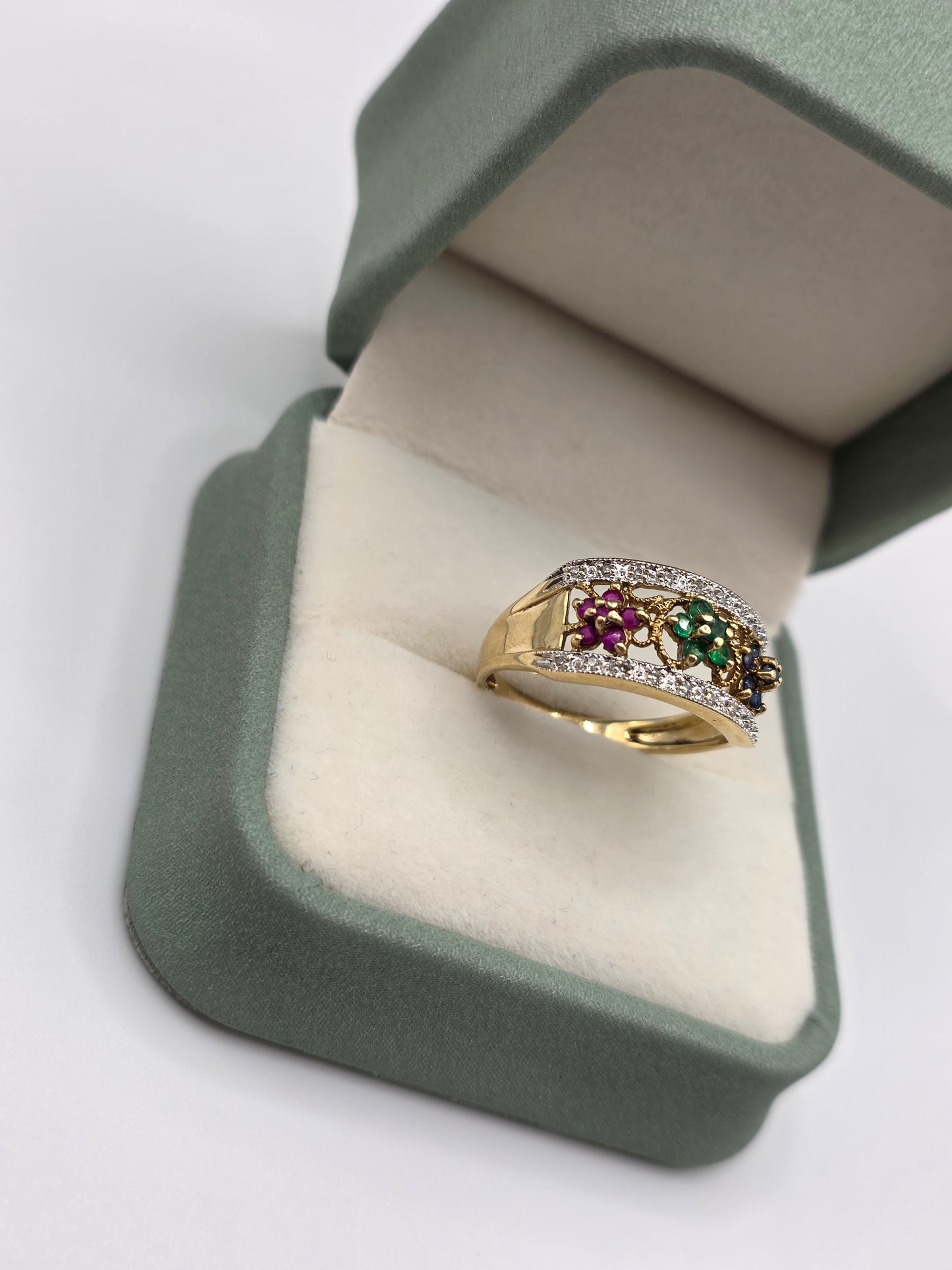 9ct gold emerald,sapphire,ruby and diamond ring