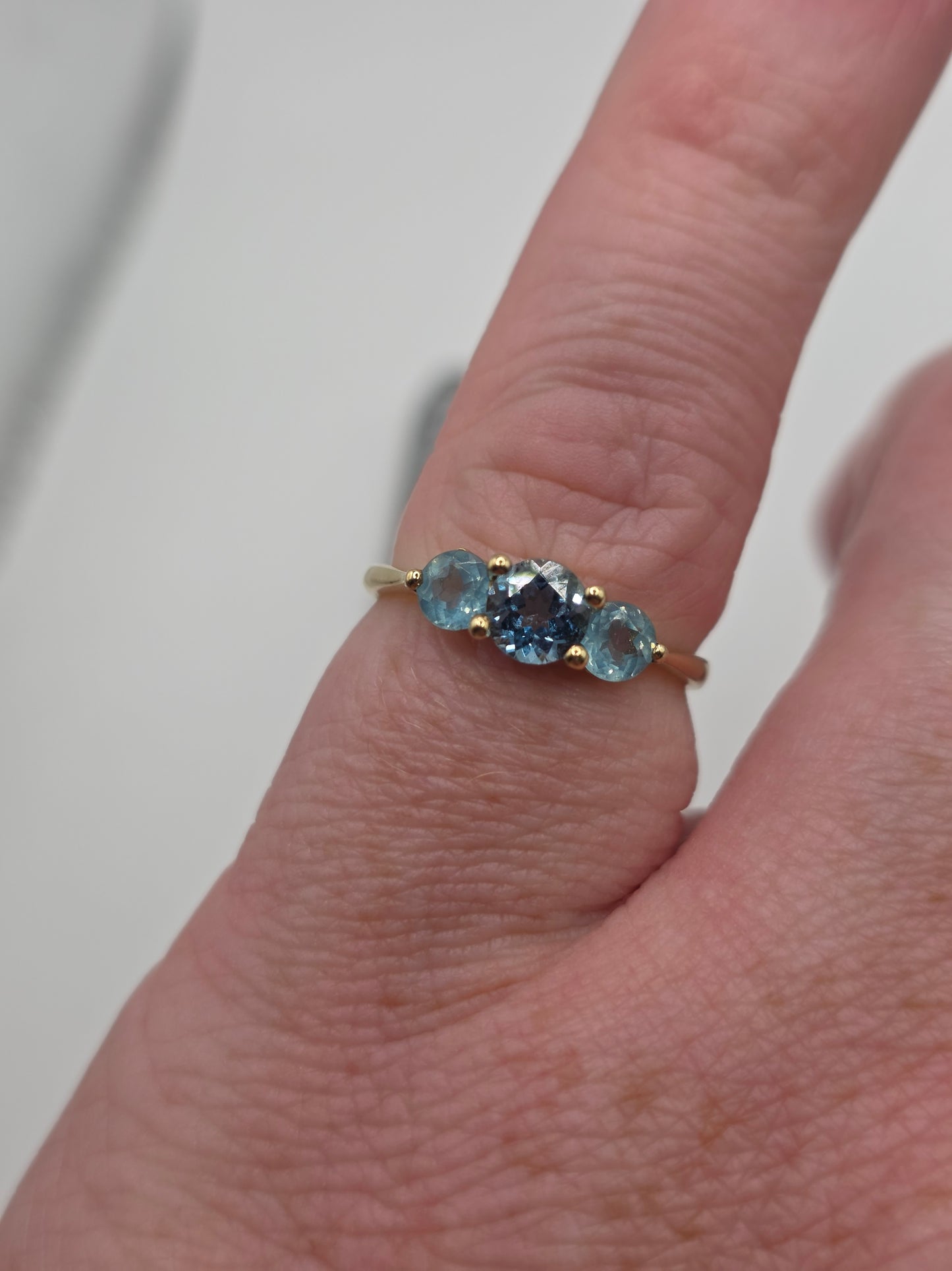 9ct gold topaz and blue cz ring