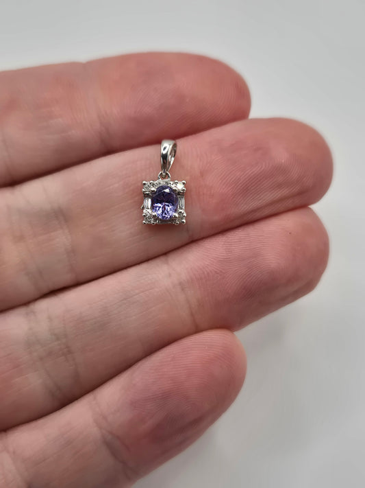 9ct white gold tanzanite and diamond pendant